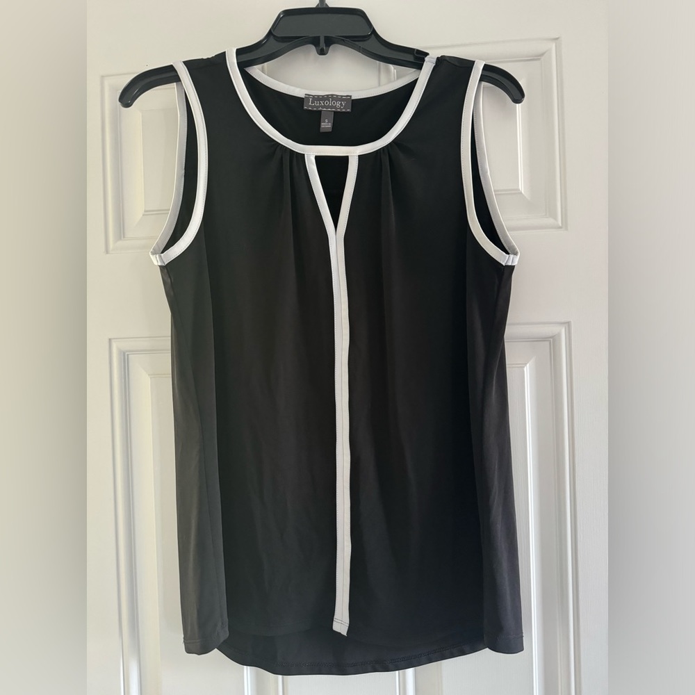 Luxology top. Black and white. Size small.  WORN ONCE.